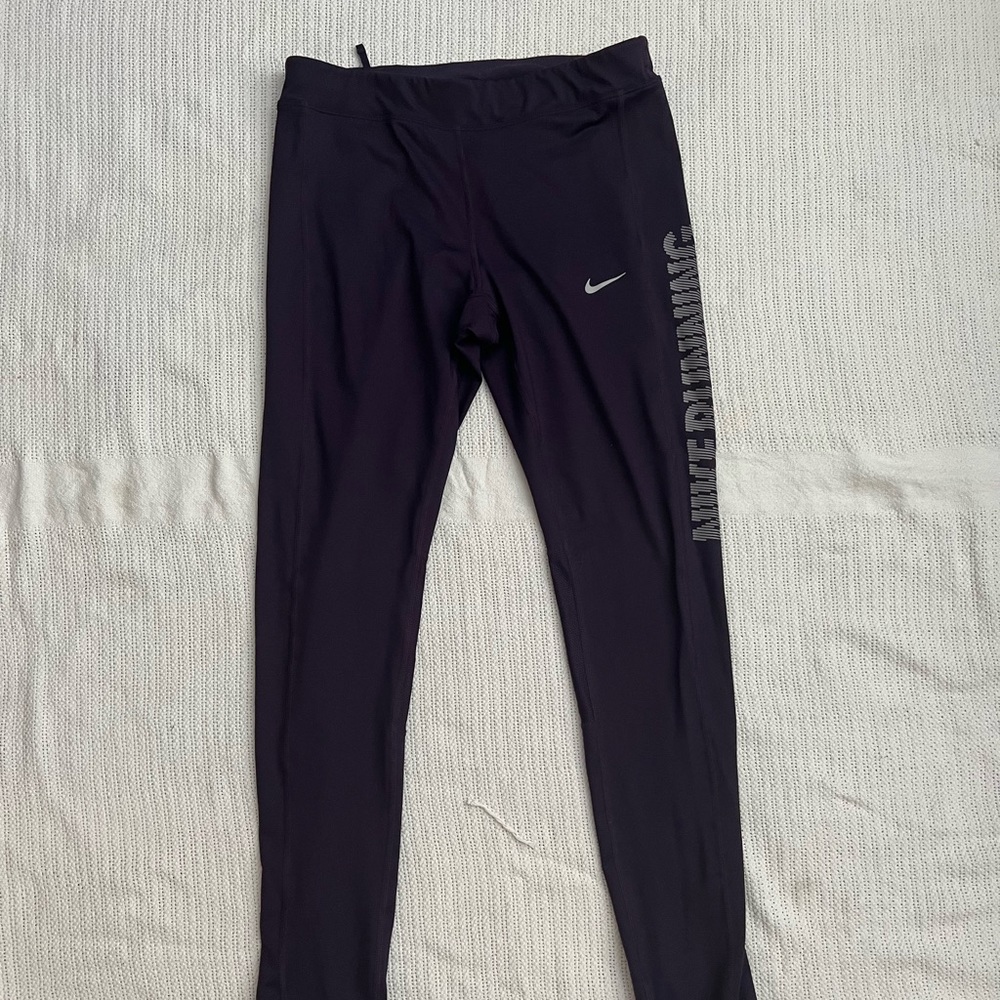 Purple Nike running leggings